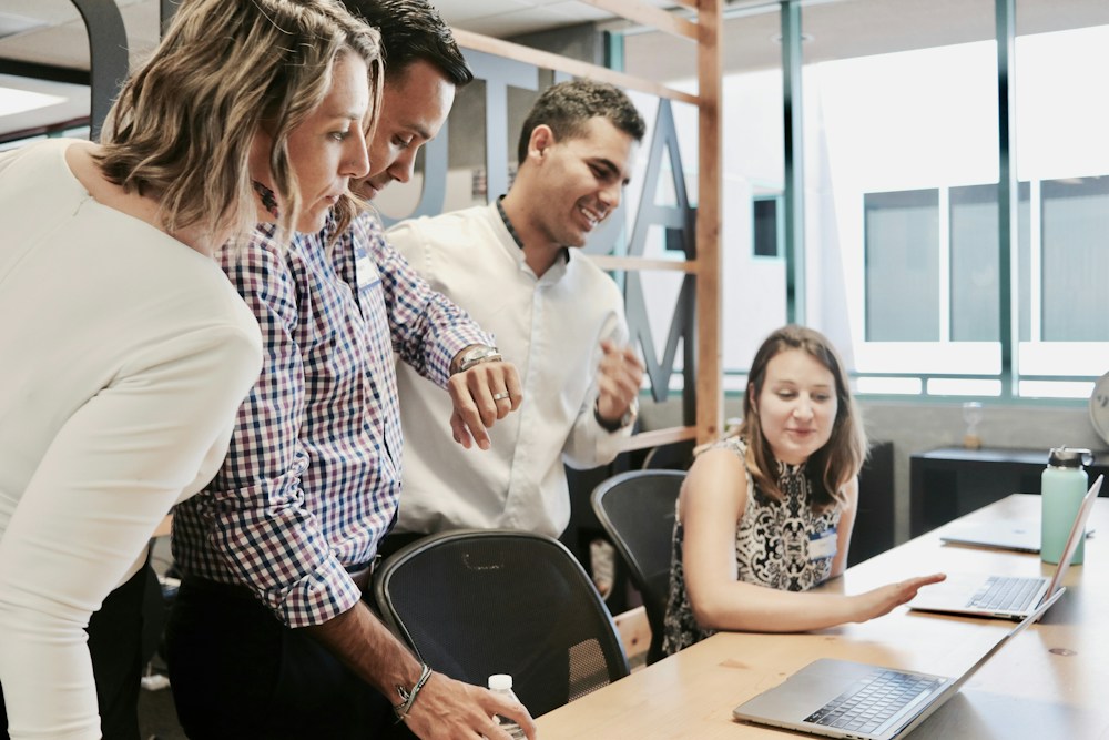 A colleague sharing an idea in a meeting